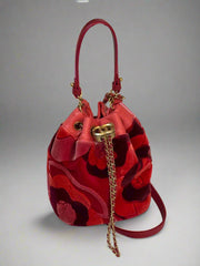 Pre-loved Chanel Camellia Velvet Drawstring Bucket Bag